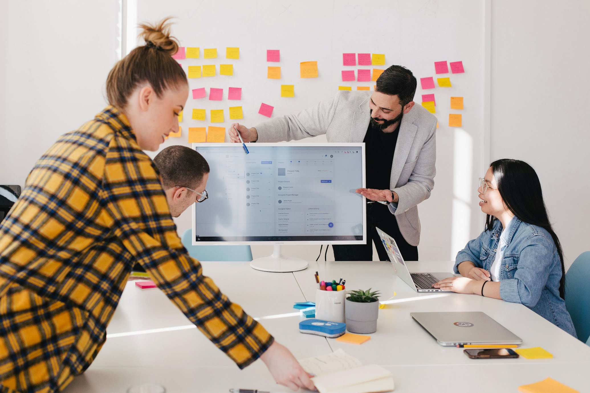 Team collaborating with AI technology